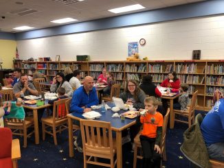 Central Elementary students and parents enjoy a thanksgiving style meal during the school day.