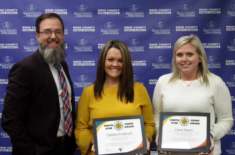 Superintendent Ledford shown with two teachers recognized by the Board on November 19, 2021