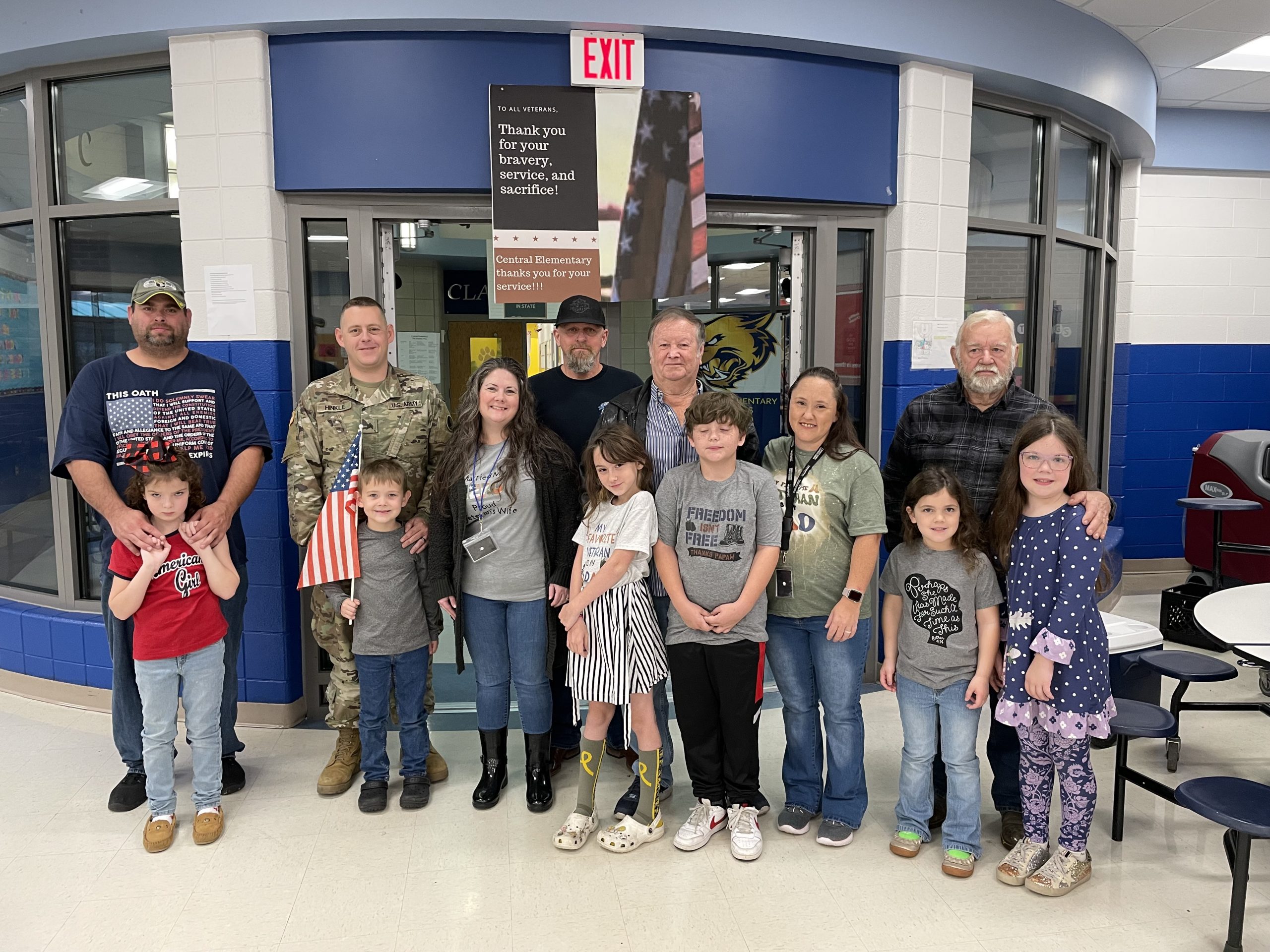 Veterans are shown with family at Central Elementary