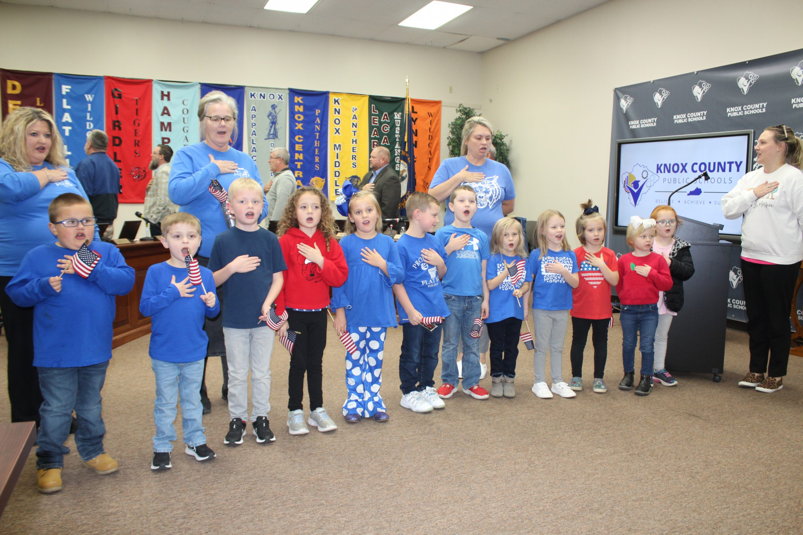 Flat Lick kindergarten students lined up to recite the Pledge in front of the Knox County Board members and audience.